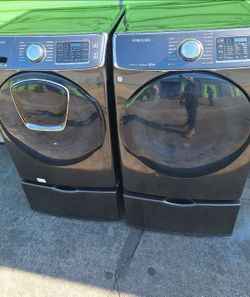 Washer And Dryer Samsung set on pedestals