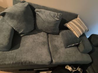Living room sofa and couch fairly new