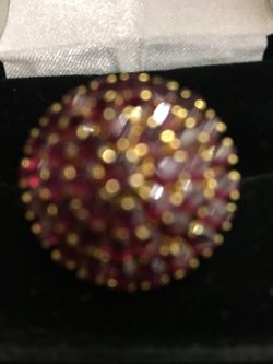 14 Kt gold 9 ctw Ruby Cluster Ring size 7 Length/withs 1/16 inches