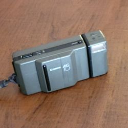 Canon MC10 MC 10 35mm Point & Shoot Film Camera  Speedlife MC-S flash. 
Pre-owned, in good working and cosmetic shape. Functionality 10 out of 
10. Co