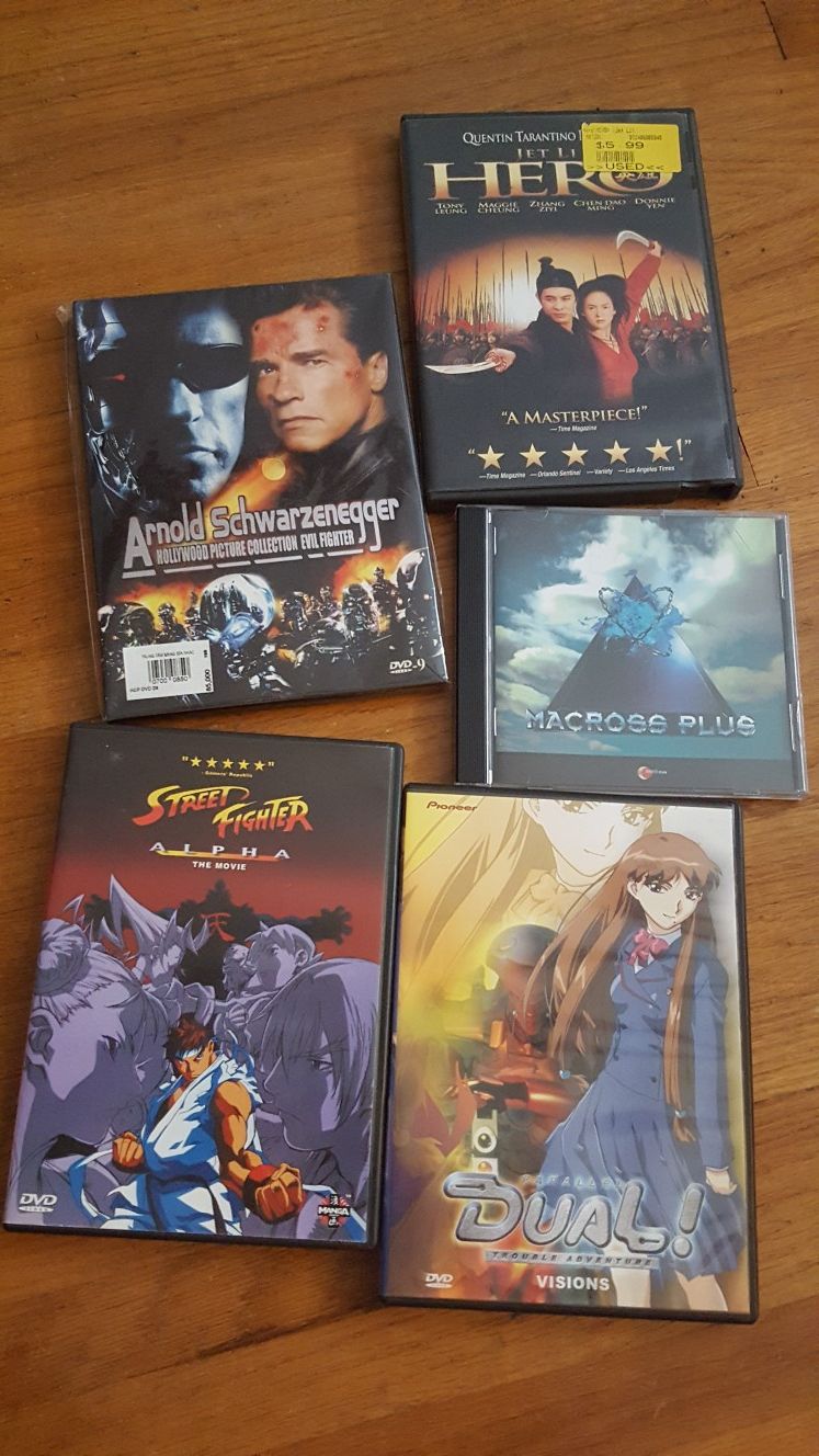 assorted dvds and macross plus cd (anime, arnold, hero)