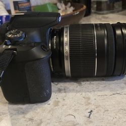 Canon Rebel T7 With EF-S 18-200mm f-3.5-5.6 IS Lens And EF 50 MM 1:1:8 STM Prime Lens