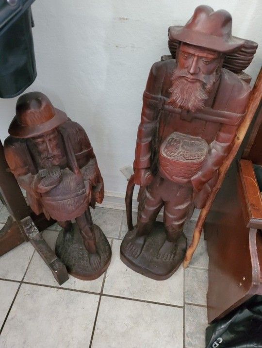 Two Beautifully Carved Pacnorwest Wood Statues