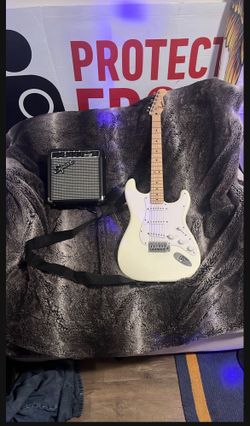Squier Guitar with amp 