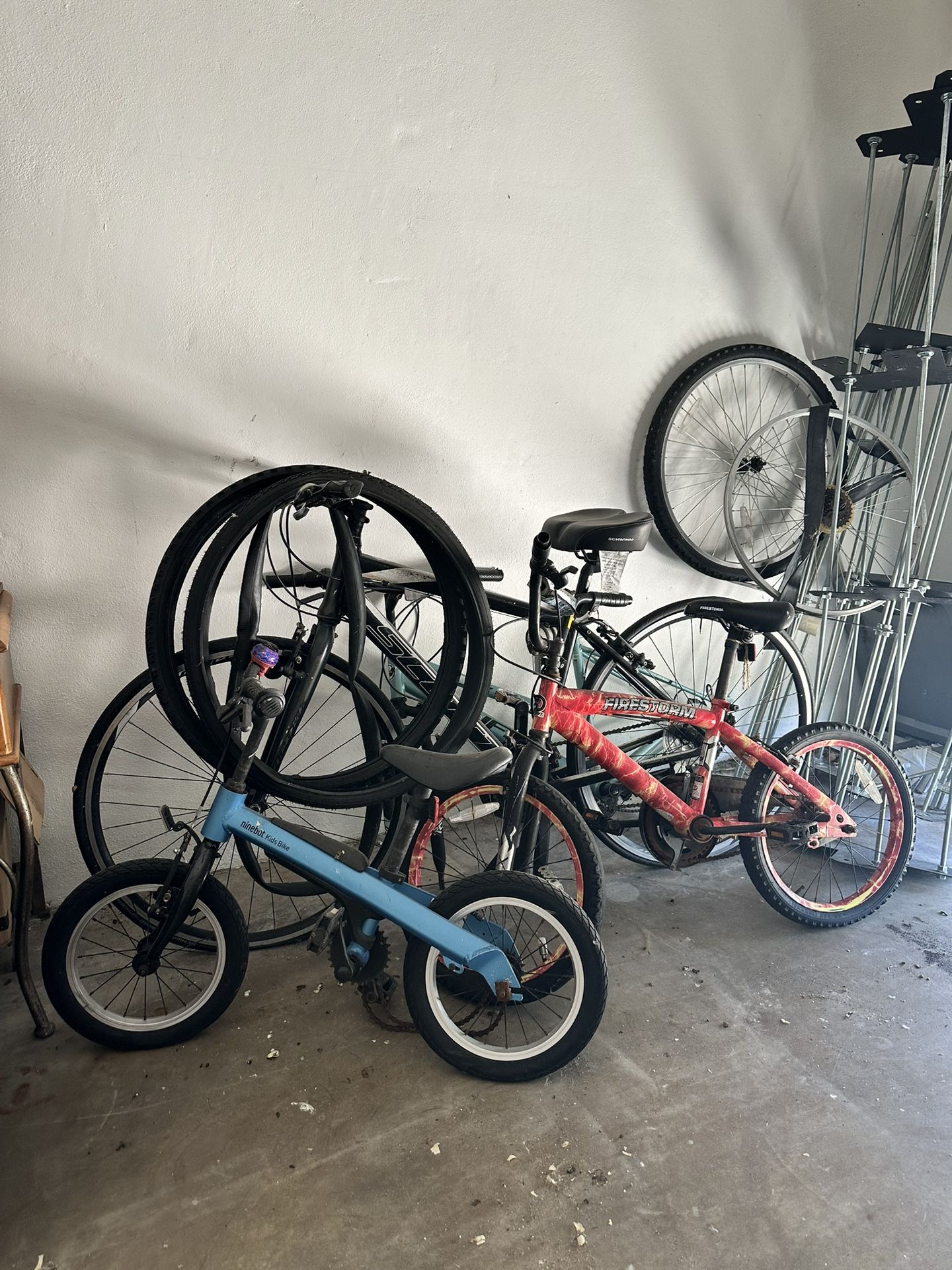 4 bikes + extra parts/tubes - $100