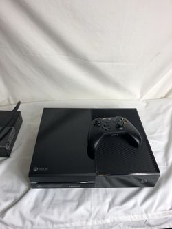 Xbox One with cords and controller