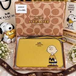 Coach x Peanuts Charlie Brown Wristlet Clutch