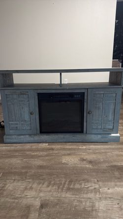 Tv stand with fire place