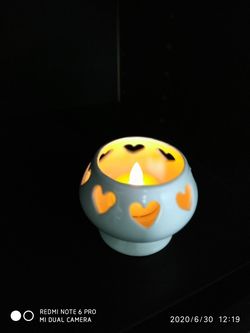 Ceramic beautiful candle holder with candle like new