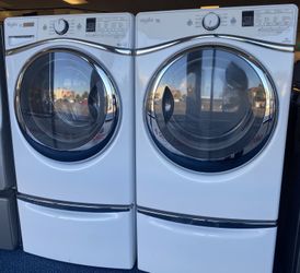White Whirlpool Duet Front Load Washing Machine and Electric Dryer Set on Pedestals (0-0111)