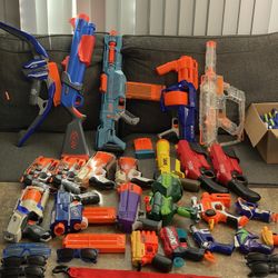 Set Of 23 NERF  GUNS 