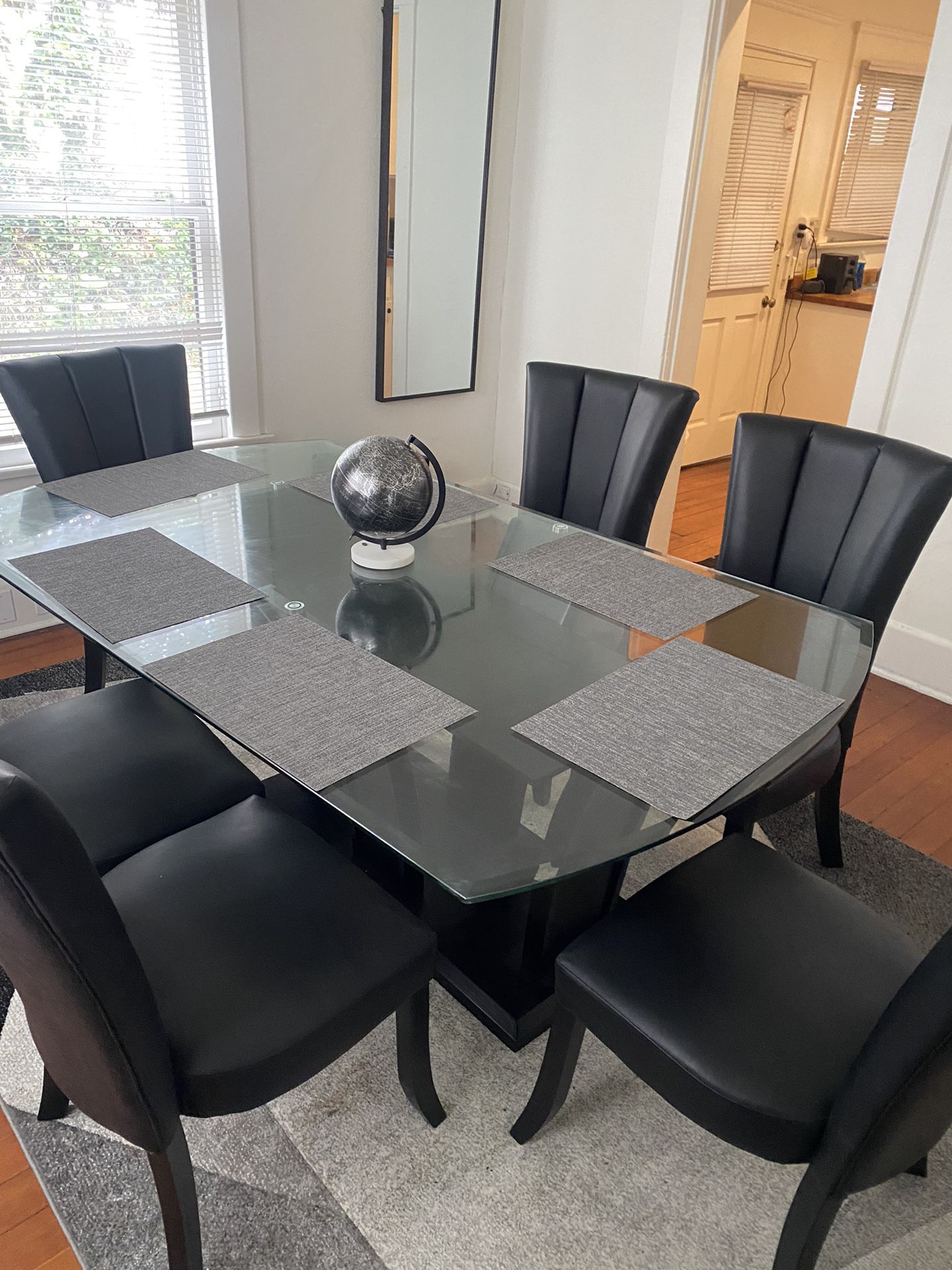 6 piece glass dinning table set, chairs and table squares included