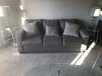 2 COUCHES WITH PILLOWS AND 3 TABLES AND 2 CHAIRS 300.00 FOR EVERYTHING