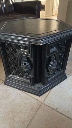 Hexagonal shape with detailed carving on the cabinet door/ side table
