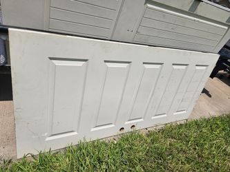 Exterior door house to garage