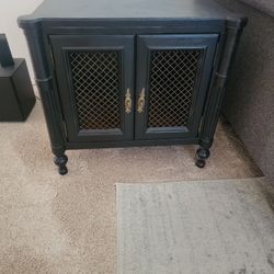 Nice Sturdy End Table With Storage.  It Has To Doors That Open So You Can Store Your Things.  