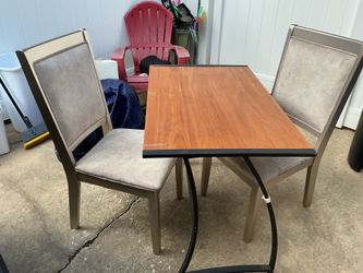 A nice IKEA table with 2 expensive chairs ( all for $40)
