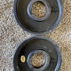 2- 2 1/2lb. Cast Iron Olympic Weights 