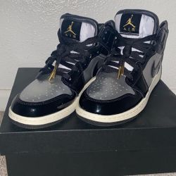 Black/Metallic Gold Air Jordan’s 
