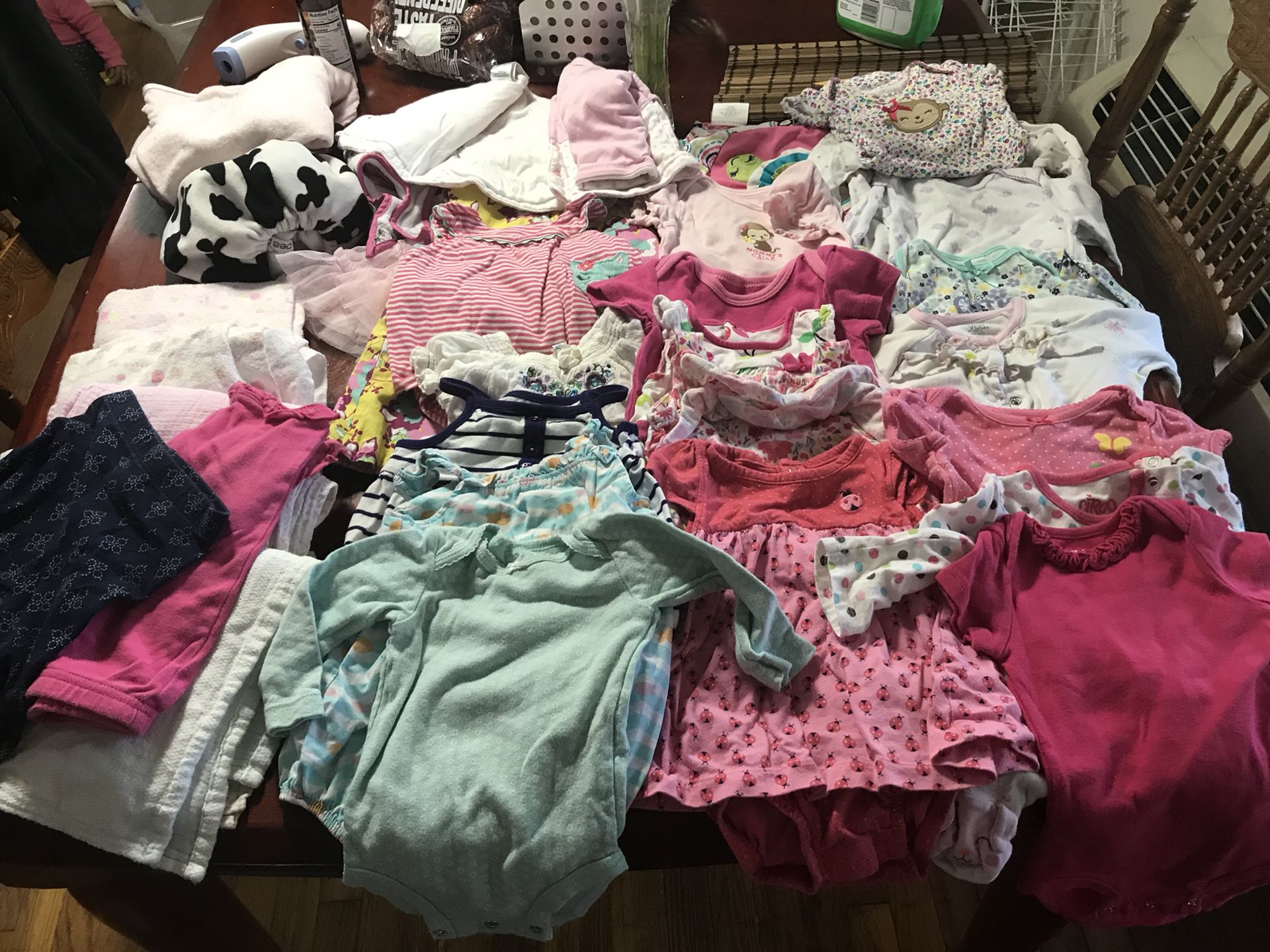 Baby clothes, mostly carters