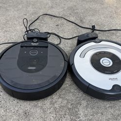 2 iRobot Roomba I7 and model 655 vacuum with chargers** for parts or repair 