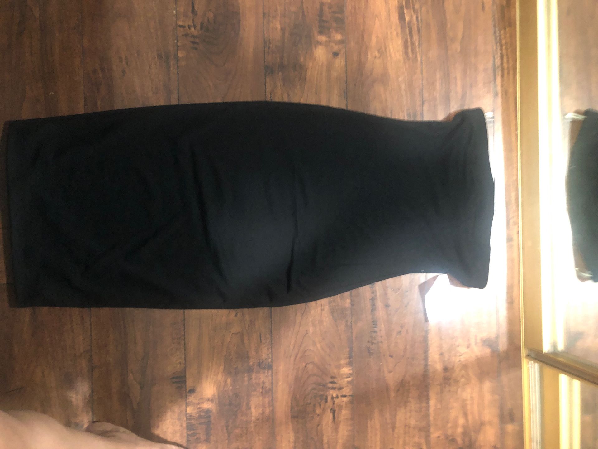 Brand new size medium knee legnth black tube dress