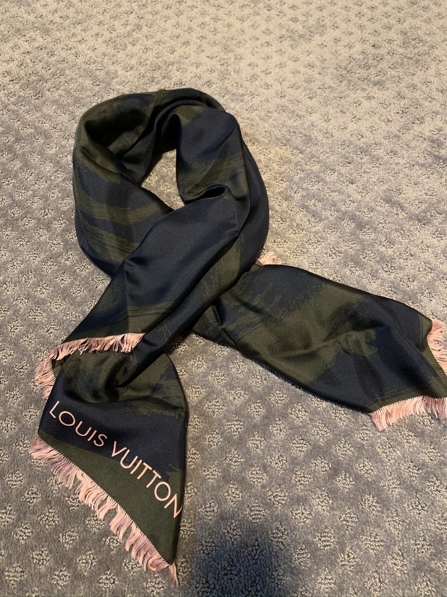 Louis Vuitton authentic silk scarf. Beautiful green and black design with pink frayed trim. 36" x 36"