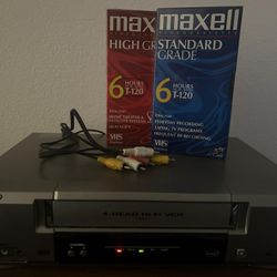 VCR PLAYER WITH WIRES AND 2 NEW SEALED TAPES TO RECORD LOCATED IN PORTERVILLE