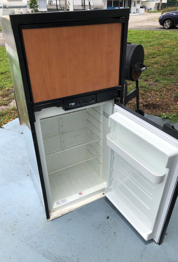 Norcold 12v gas and 110v refrigerator for part for Sale in Fort