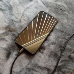 Samsung Galaxy S25 FE With Blue Case, Dark Grey Body, 6.7"