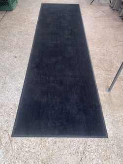 3’ x 10’ black Alsco outdoor Rug
