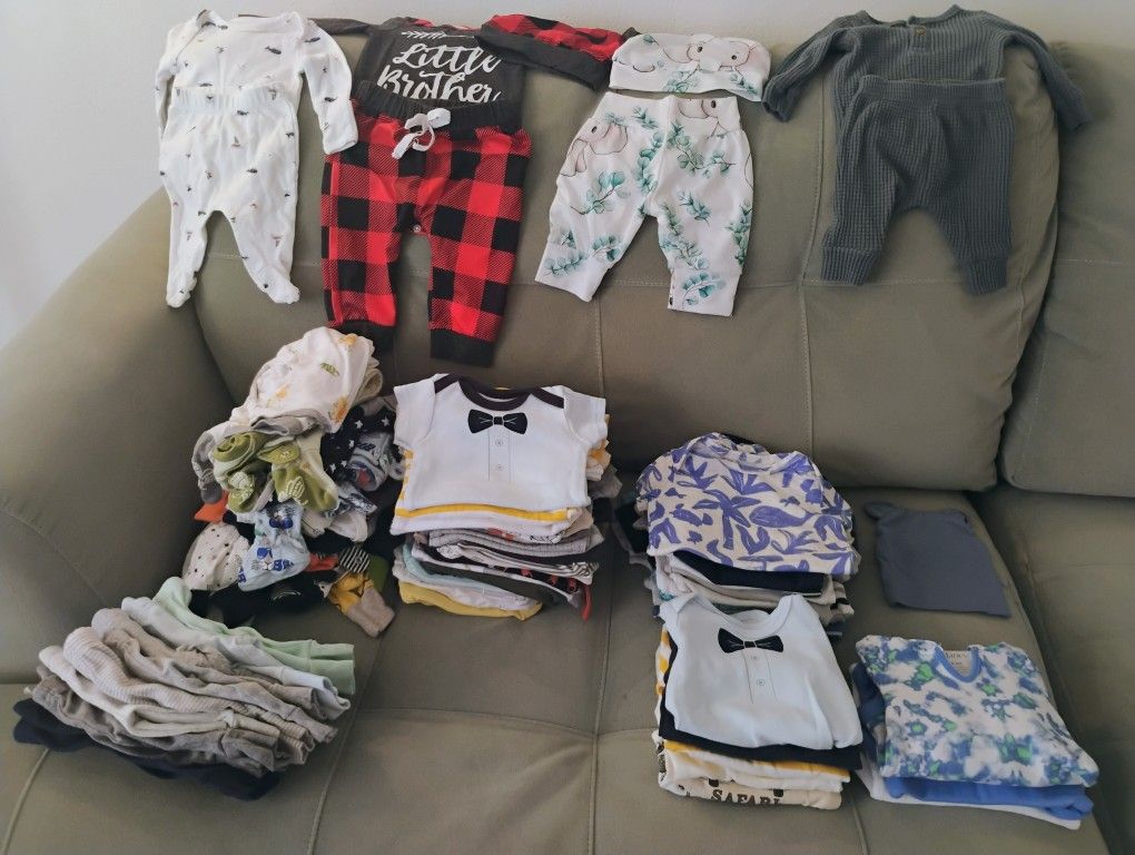 76 Pieces Of Baby Clothing (Like New)