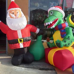 Santa And Dinosaur Inflatable 