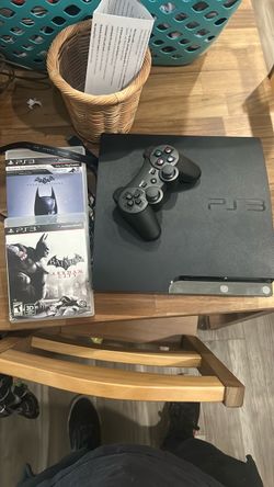 PS3 slim with 2 games