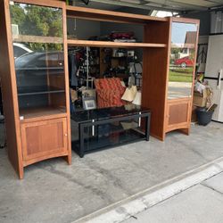 Very Solid Entertainment Center!!!! Plenty of storage. Selling with or without tv stand your choice. $225 with stand OR $175 without. Unit can expand 