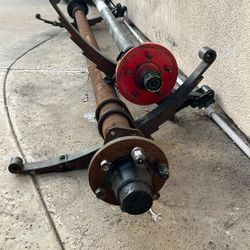 2 Trailer Axles One Is 6 Screws And The Other 5