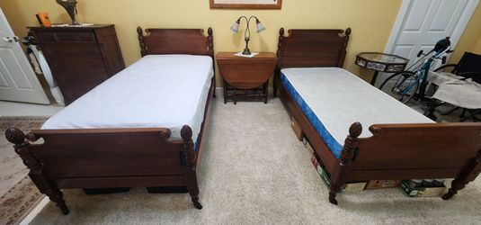 Two beautiful antique twin beds