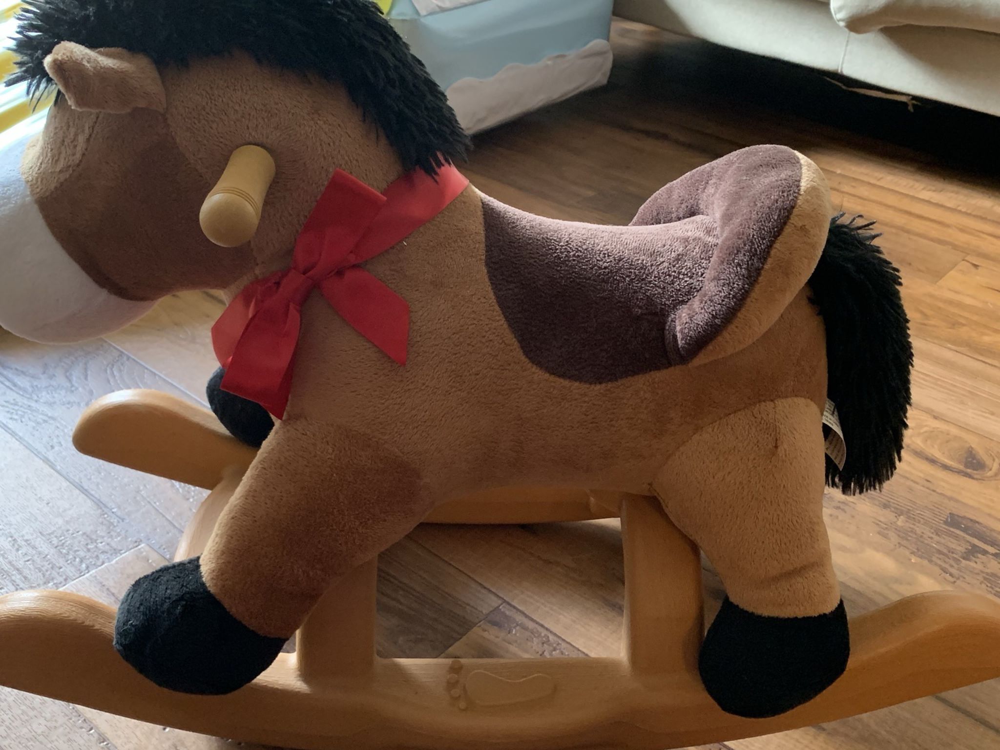 Like Brand New. Pony land 24 Inches Brown Rocking Horse With Riding Sound (retail $66)