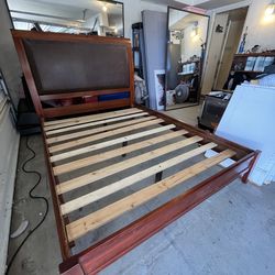 bed and chest of drawers with mirror