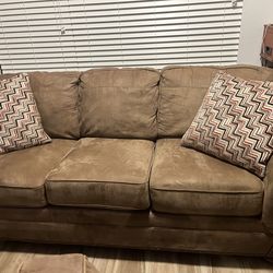 Two Ashley Furniture brand Couches