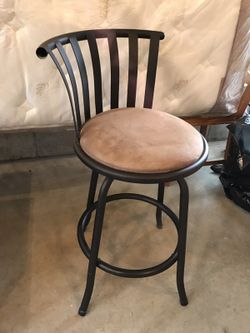 One Swivel Bar Stool