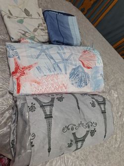 FOUR TYPES OF SHOWER CURTAINS