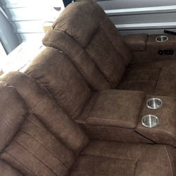 Brown Power Reclining Loveseat With Console, Adjustable Headrests And USB Charging Ports 