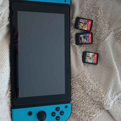Nintendo Switch & 3 Games 