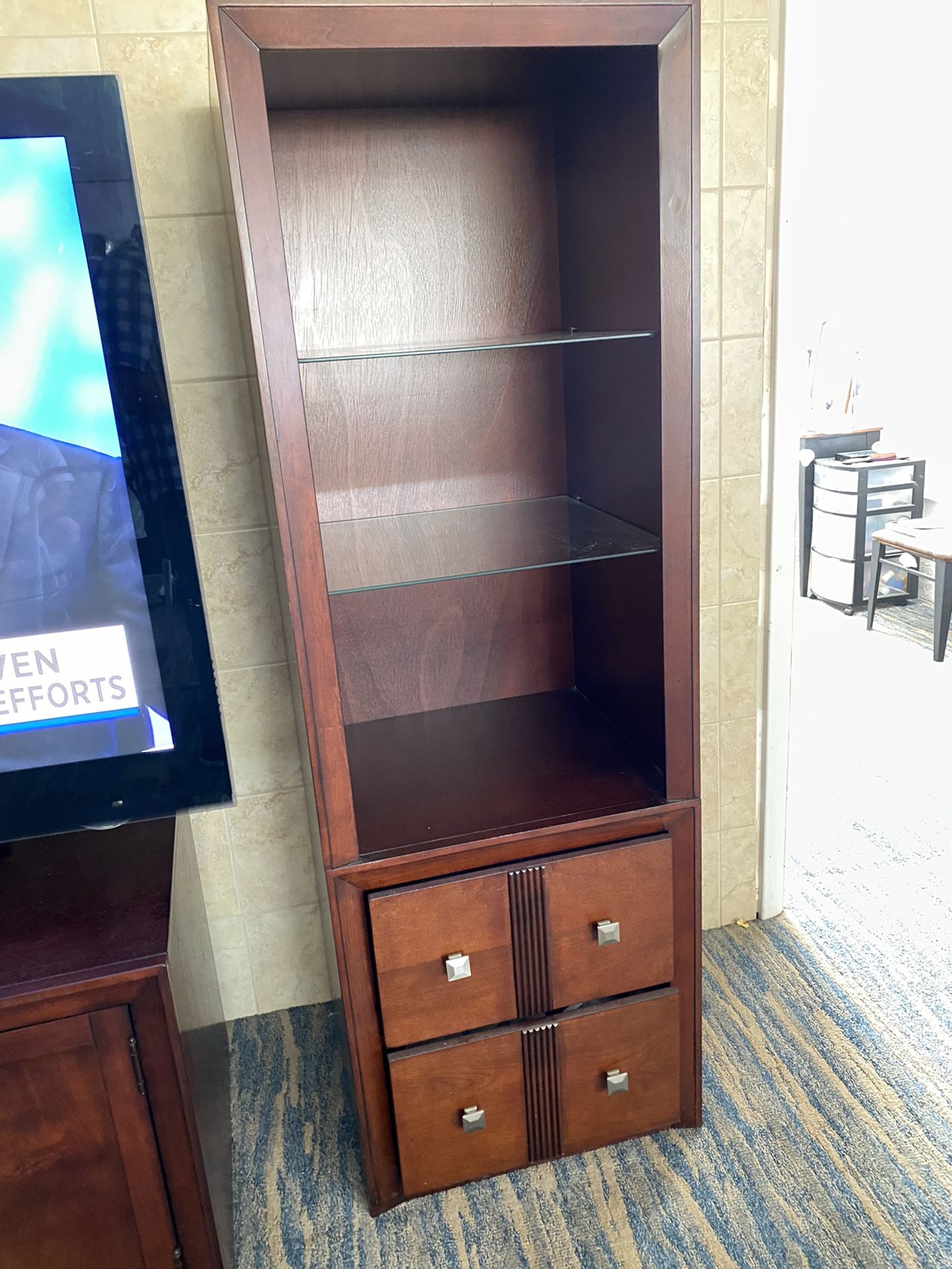 Furniture wall unit in good condition also dining room glass table with six chairs and three glass tables 500 cash