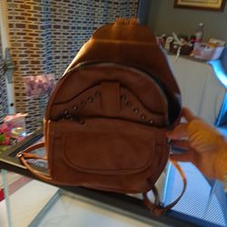 Small Back Pack Bag Pockets Up Front And One Pocket In The Back