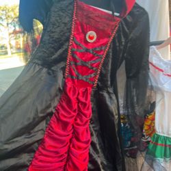 Spirit costume red dress with a cape on it pretty nice for a maybe a 10 year-old girl