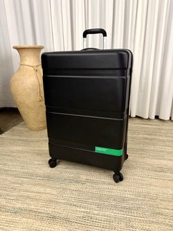 DELSEY PARIS X United Colors of Benetton Large Spinner Suitcase