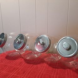 Set of 4 Clear Slant Canisters w Steel Lids