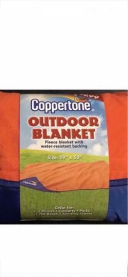 CA. COPPERTONE OUT DOOR BLANKET. HAS NOT BEEN USED BUT STORED.
